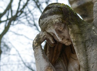 Sculpture of a sad woman